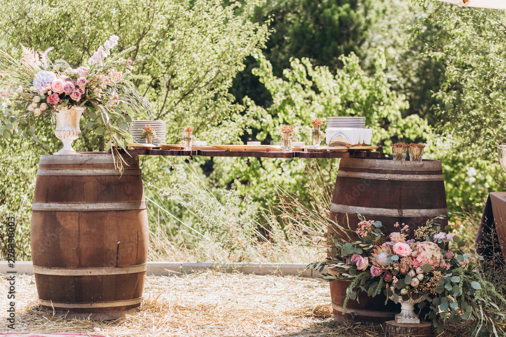 Obraz premium Boho wedding table with eco decor for guests.