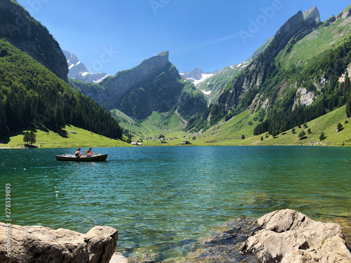 Alpine lake Seealpsee in the Alpstein mountain range and in the Appenzellerland region - Canton of Appenzell Innerrhoden (AI), Switzerland photo