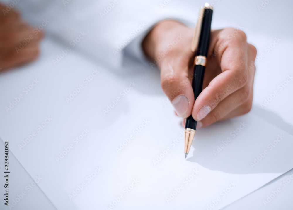 close up.the doctor writes a prescription close up.the doctor writes a prescription