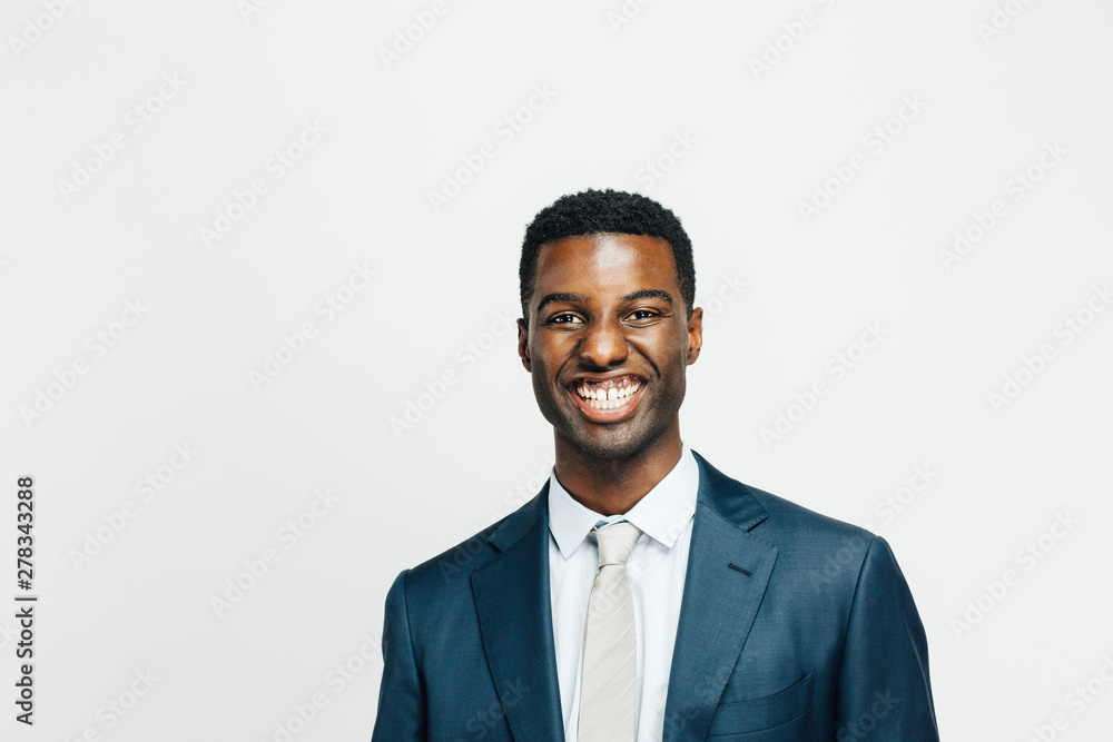 Portrait of a smiling, happy man in suit and tie, isolated on white studio background Portrait of a smiling, happy man in suit and tie, isolated on white studio background