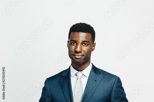 Portrait of a  man in suit and tie , isolated on white studio background
