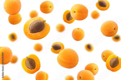 Falling apricot isolated on white background, selective focus