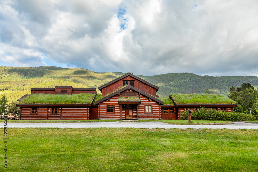 Traditional turf roof house with green hills in the foreground, Valle, Aust-Agder county, Norway Traditional turf roof house with green hills in the foreground, Valle, Aust-Agder county, Norway