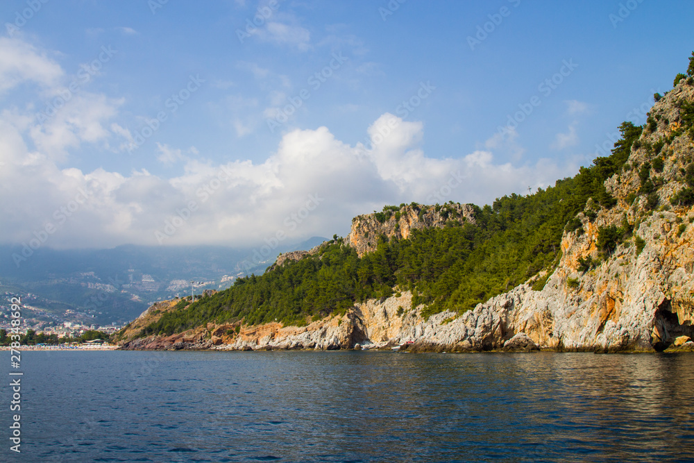 Mediterranean sea, mountain and sky. Holidays in Turkey, Alanya. Summer, Sunny day