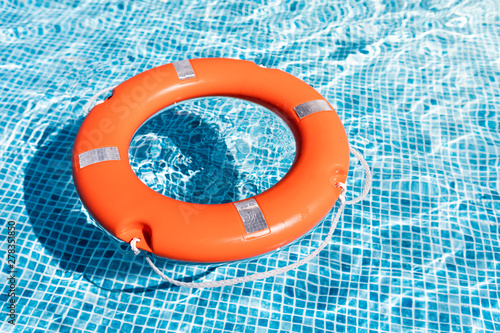 Orange salvage float in blue water