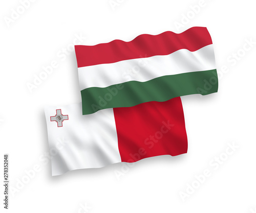National vector fabric wave flags of Malta and Hungary isolated on white background. 1 to 2 proportion.