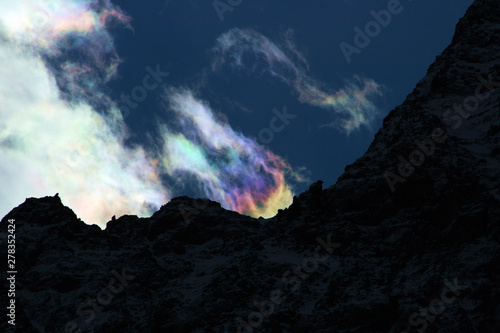 Caucasus. Ossetia. Gorge Genaldon. Rainbow in the clouds.