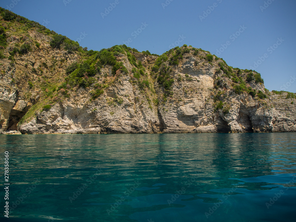 Rocky shores and blue Adriatic sea near the town of Budva, Montenegro