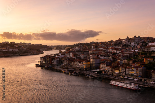 View from D. Luis bridge to the city of Porto and to the Douro river at sunset.
