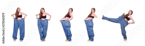 Woman in dieting concept with big jeans