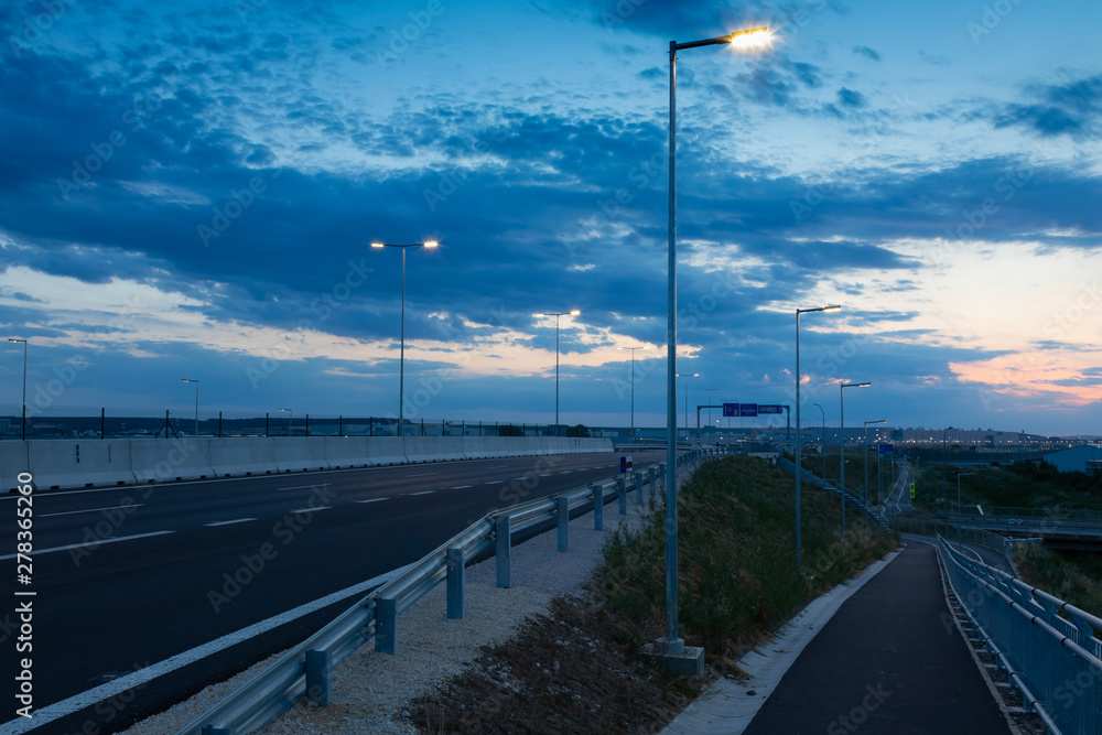 empty road with modern LED street light after the sunset