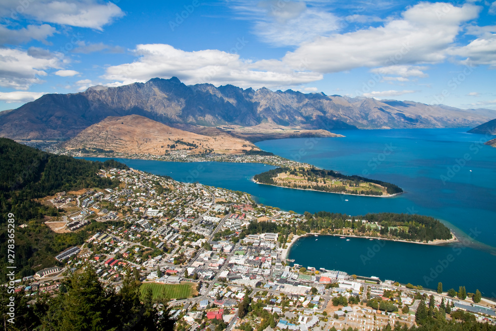 Scenic view of Queenstown, New Zealand looking over Lake Wakatipu and The Remarkables.