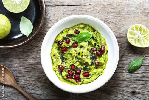 Avocado dip with Basil Olive oil and Pomegranate topping