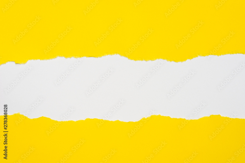 pieces of yellow paper on white background with copy space pieces of yellow paper on white background with copy space