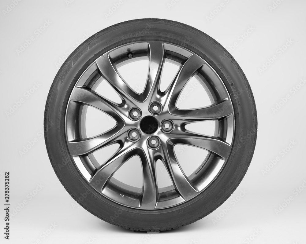 isolated tires and wheels for the car  on a white background