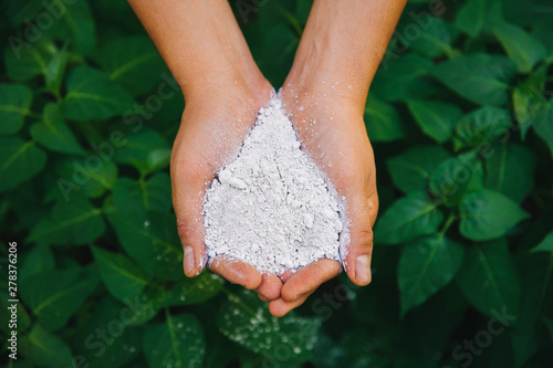 Photos Farmer hands holding chemical organic nutrient agricultural plant fertilizer in
