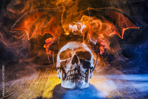 Smoking. A human skull in s...