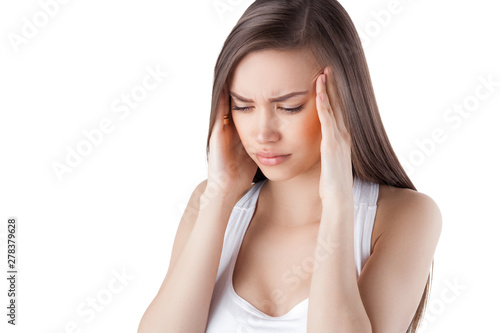 Woman on isolated white background having head or stomach ache. Female closeup feeling sick. Lady feels pain.