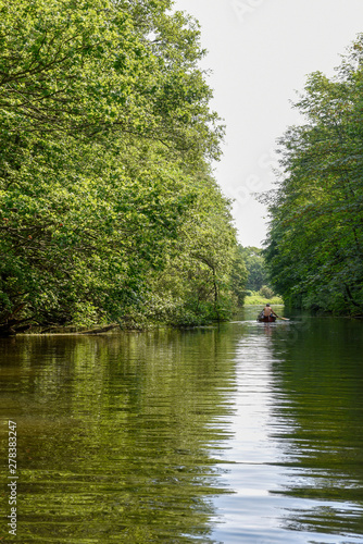 People rowing in a canoe on the river at Vestbirk  Denmark