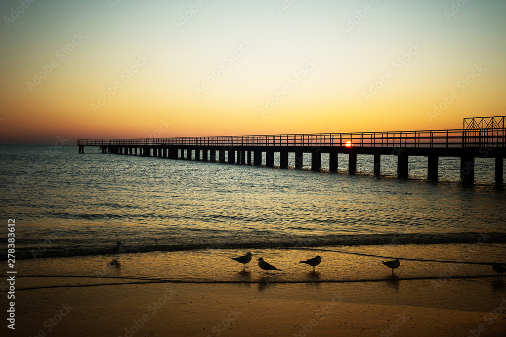 evening seascape with pier