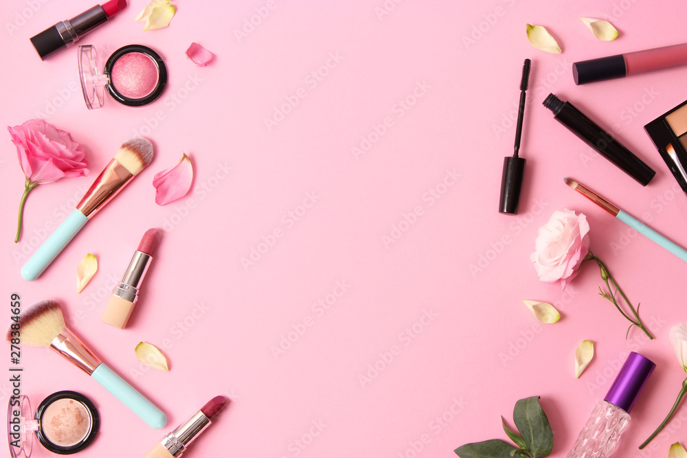 cosmetics and flowers on a colored background top view. cosmetics and flowers on a colored background top view.