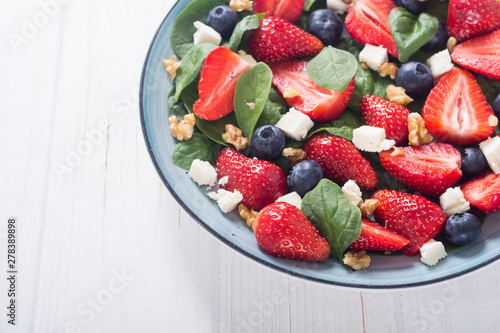 Summer Strawberry salad with spinach   cheese   nuts and blueberry