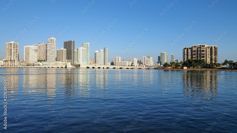 Residential towers on the Intracoastal Waterway and Biscayne Bay, Miami, Florida, on a calm autumn morning. Residential towers on the Intracoastal Waterway and Biscayne Bay, Miami, Florida, on a calm autumn morning.