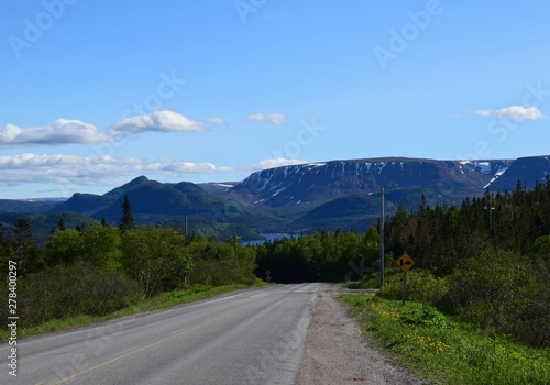 road to Norris Point, Tablelands in the background the Gros Morne national park, Newfoundland Canada