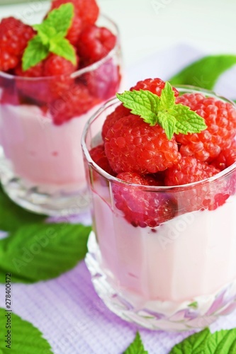 Delicious dessert of ripe raspberries.Healthy diet.