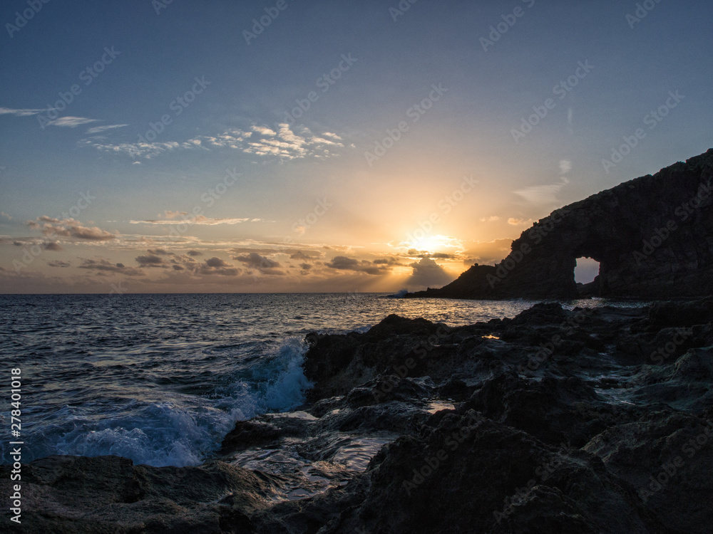 sunrise at the elephant arch of the island of Pantelleria, Italy