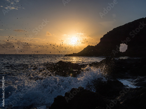 Obraz na płótnie sunrise at the elephant arch of the island of Pantelleria, Italy
