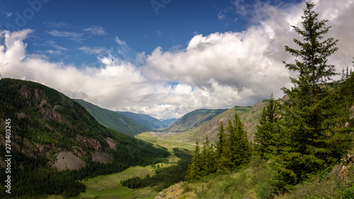 mountain panorama in Altai with Aktash in the valley, Russia, June