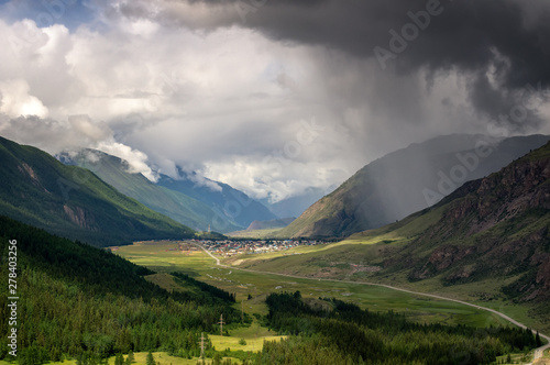 mountain panorama in Altai with Aktash in the valley, Russia, June