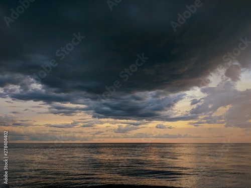 cloudy skies over the sea