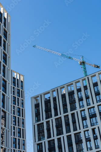 Construction of residential buildings, new multi-storey houses in Kiev, the capital of Ukraine © pundapanda