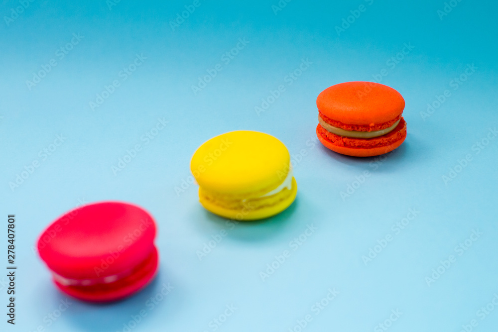 Close-up shot of colored macaroons in different position Close-up shot of colored macaroons in different position
