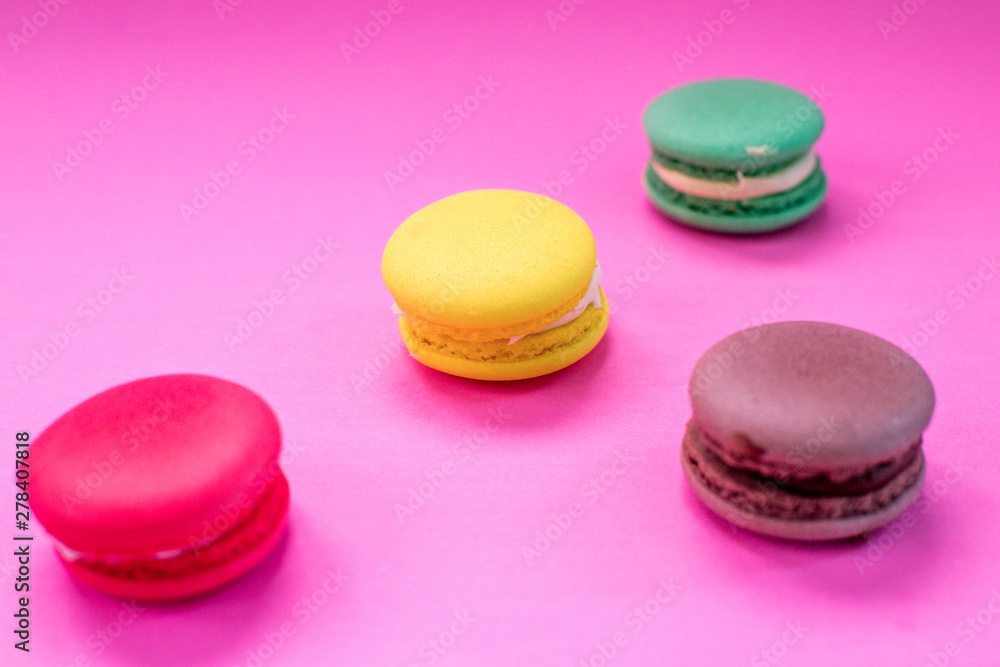 Close-up shot of colored macaroons in different position Close-up shot of colored macaroons in different position