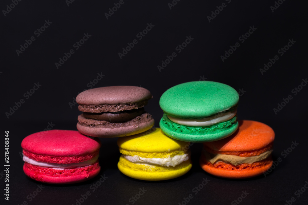 Close-up shot of colored macaroons in different position Close-up shot of colored macaroons in different position