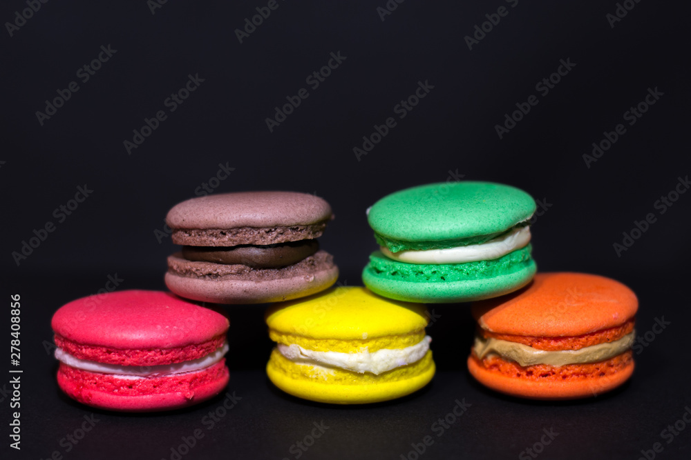 Close-up shot of colored macaroons in different position Close-up shot of colored macaroons in different position