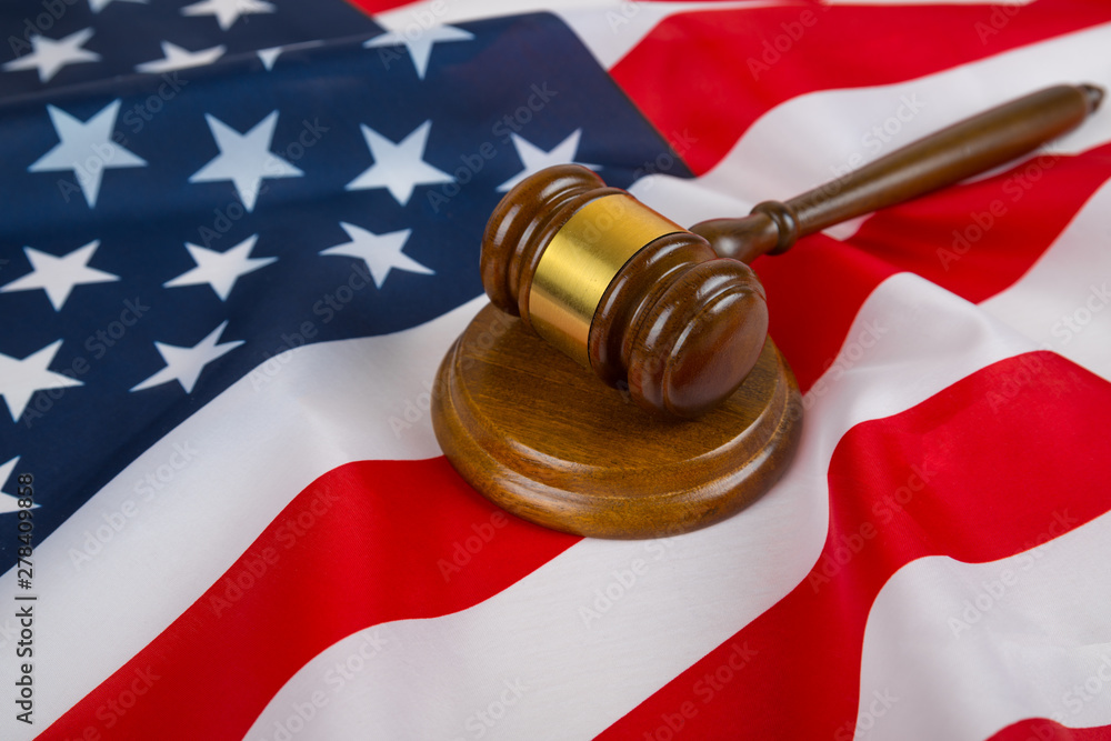 Judge gavel on the background of the flag united states of America. symbol for jurisdiction. US - obrazy, fototapety, plakaty 