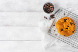 raisin bread on white wooden table background, top view