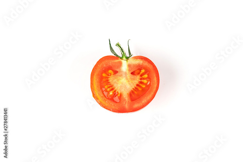 Tomato half slice isolated on white background, top view