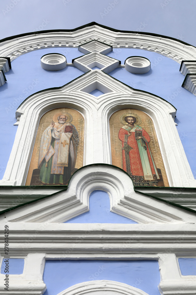 Frescoes of saints on wall