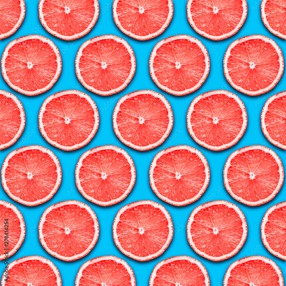 Red grapefruit slices design background. Red grapefruit slices design background.