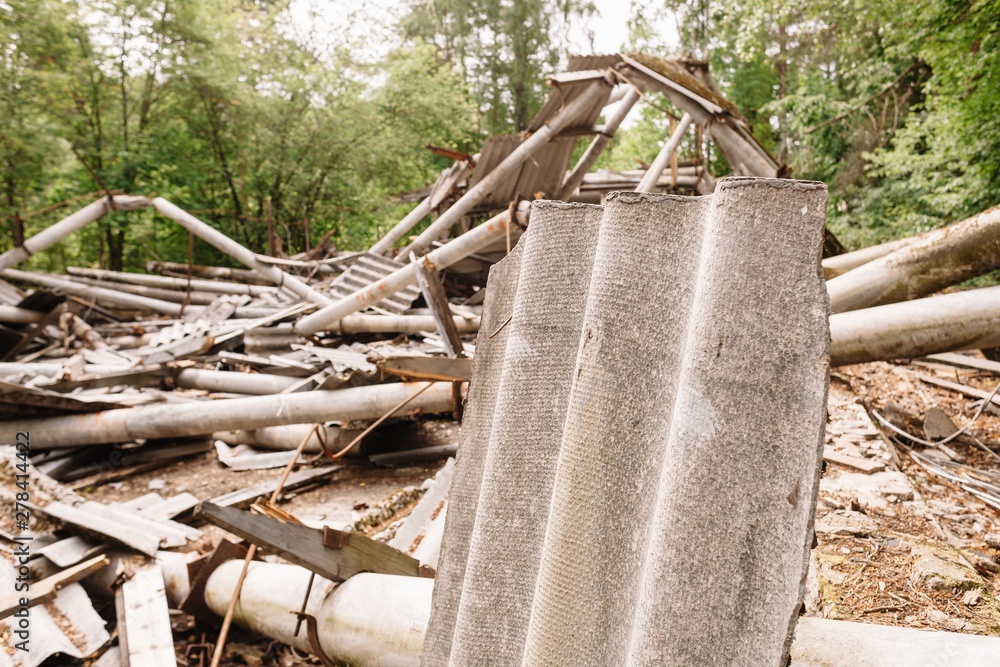 Dilapidated building with reinforced concrete columns and broken slate. Dilapidated building with reinforced concrete columns and broken slate.