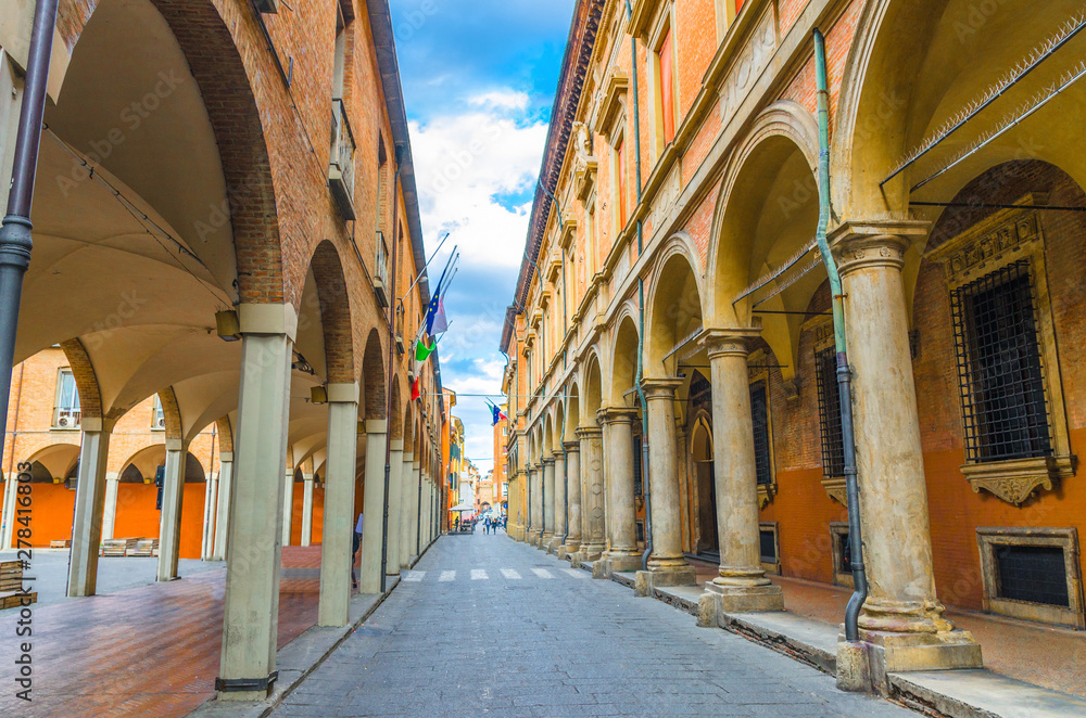 Typical italian street, buildings with columns, Palazzo Poggi museum, Accademia Delle Scienze Since Academy, University in old historical city centre of Bologna, Emilia-Romagna, Italy