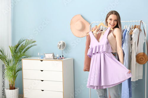 Happy woman with stylish dr...
