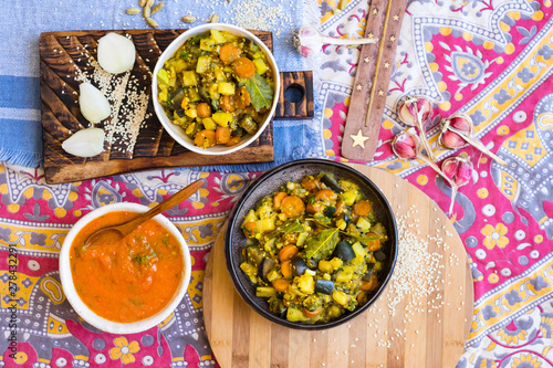 Indian sabji - traditional homemade vegetable's stew with spices. Tomato, potato, aubergine, carrot.