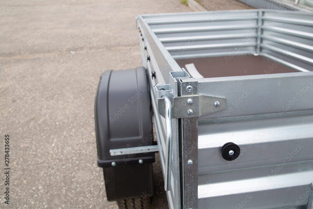 Fototapeta premium Open road trailer. Shop selling car trailers.