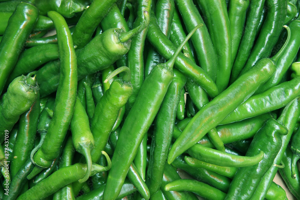 green chili peppers as background green chili peppers as background